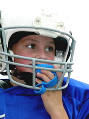 Child with football mouthguard