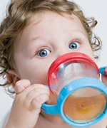 Child with sippy cup